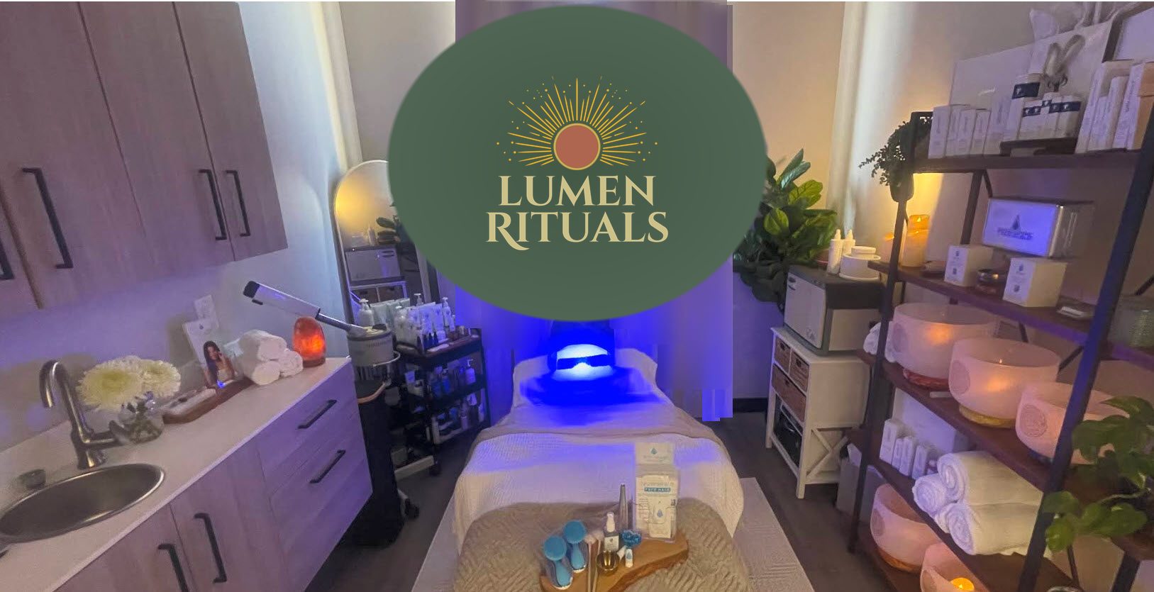 Inside the Lumen Rituals studio — treatment bed with LUMEN RITUALS branding