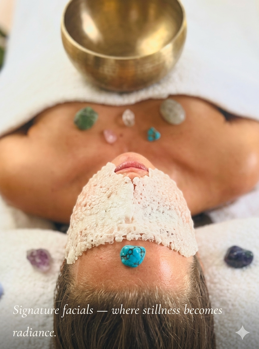 Restorative facial in progress — held with presence and care